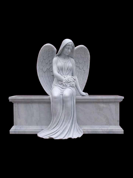 Sitting angel marble tombstone