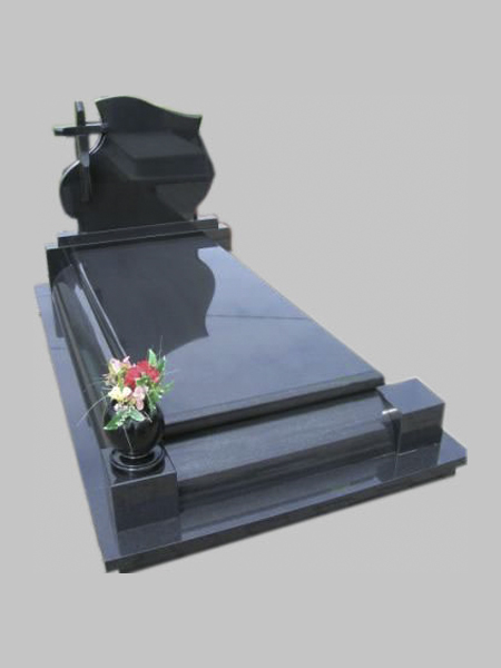 Black granite tombstone with a cross